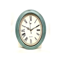 OVAL ROMAN NUMERAL CLOCK