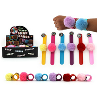FLUFFY BALL SLAP BANDS 21.5CM UN24