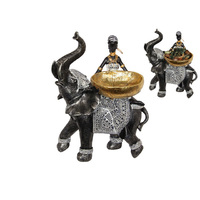 30CM AFRICAN LADY ON ELEPHANT